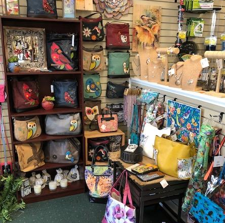 purse, crossbody, texting panel, tassel