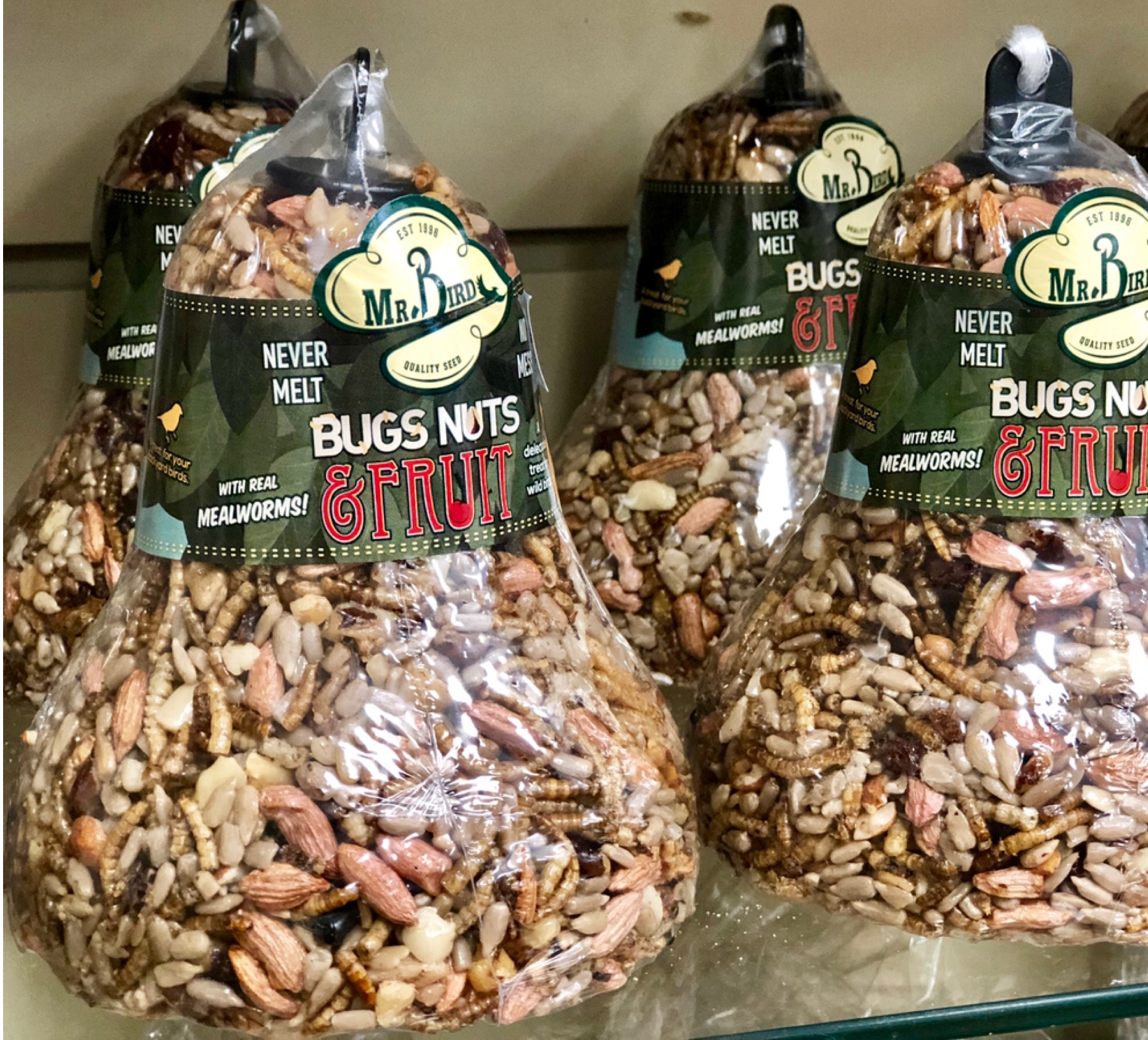 seed bell, bird seed, bird food, bugs, nuts, fruit, mealworms
