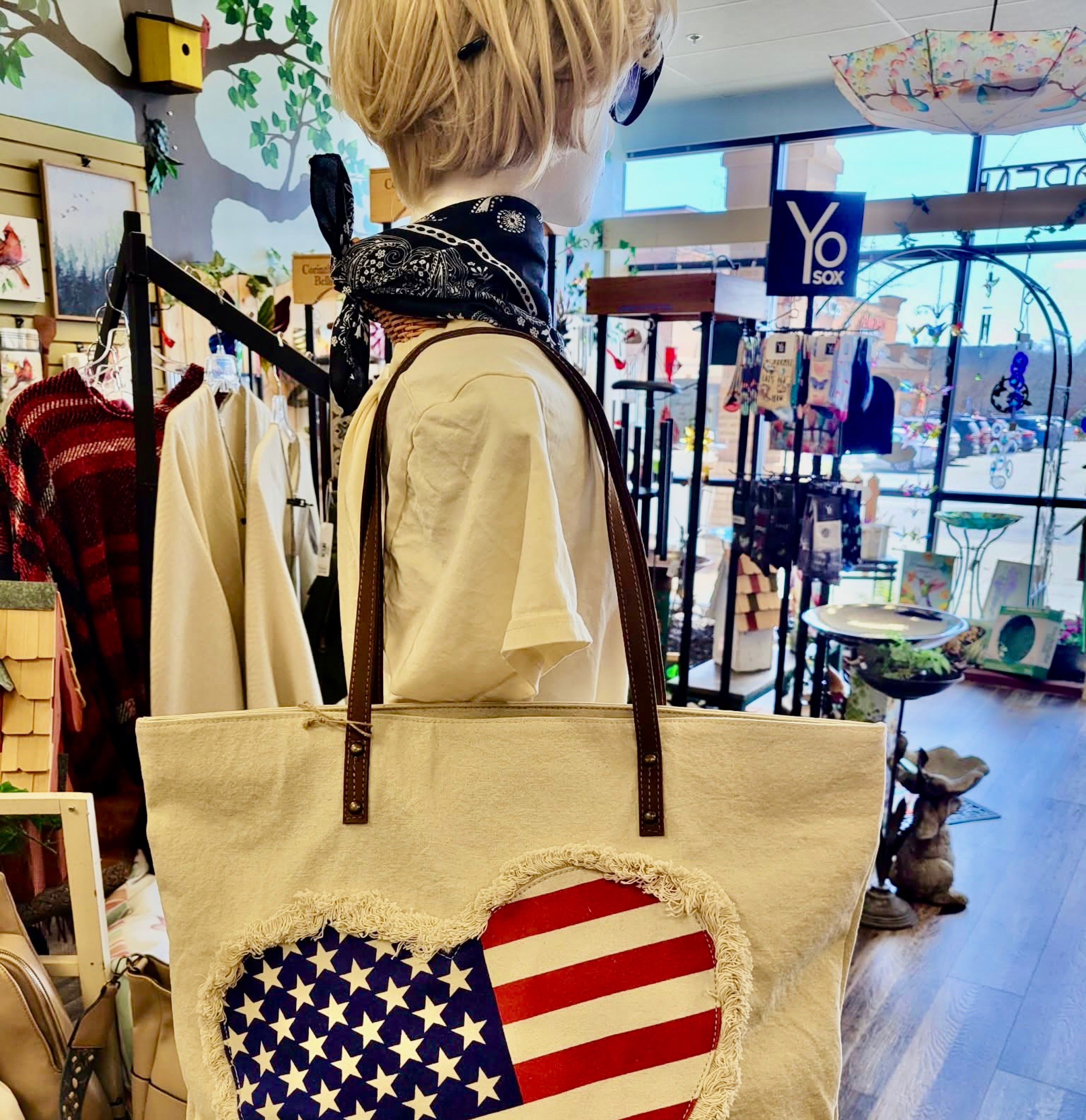 Jewelry, apparel, and bags available at Bird Watcher Supply Company